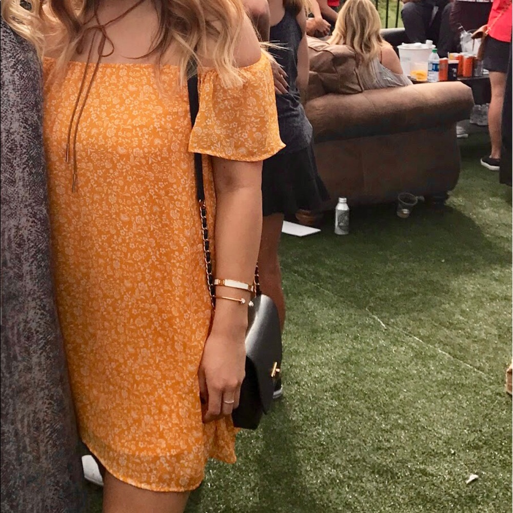 Forever 21 yellow off the shoulder mini dress.